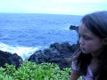 Ava talks near the ocean
