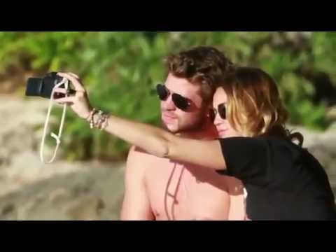 Miley & Liam spending time on the beach in Hawaii Miley & Liam spending time on the beach in Hawaii